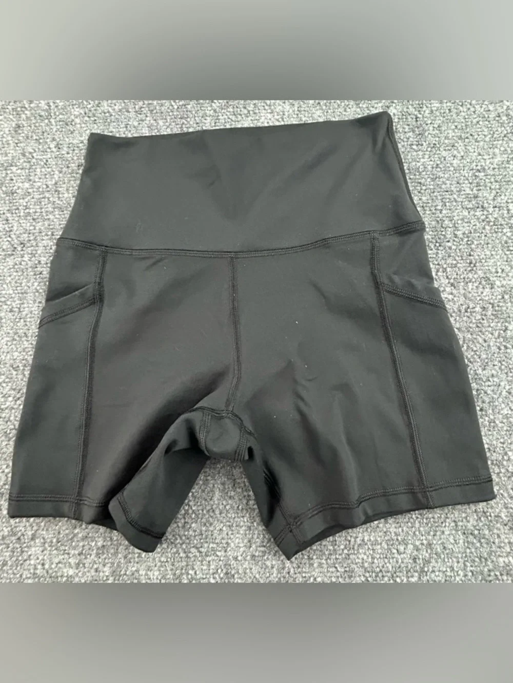 OFFLINE By Aerie The Hugger High Waisted Pocket Bike Short in Black, size M